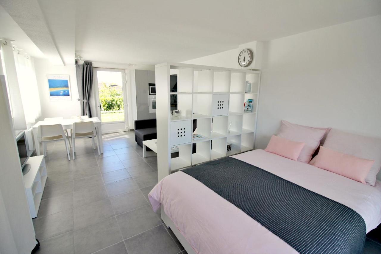 Chez Regine Apartment อาร์โรม็องเชอเลส์แบ็ง ภายนอก รูปภาพ