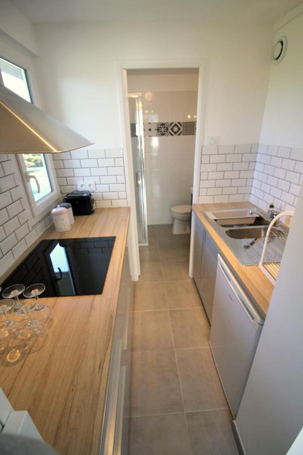 Chez Regine Apartment อาร์โรม็องเชอเลส์แบ็ง ภายนอก รูปภาพ
